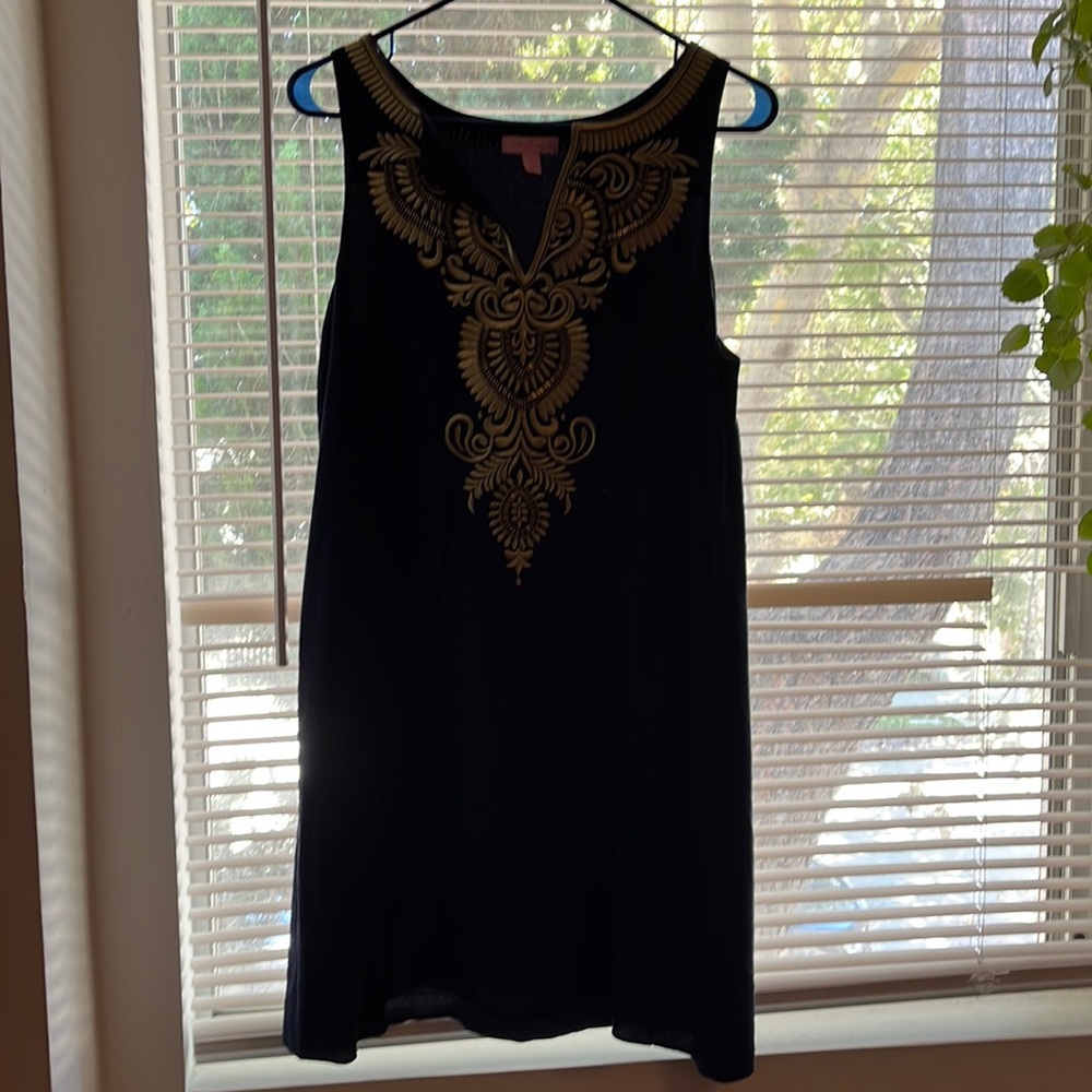 Navy Lily Pulitzer dress with gold detailing on the collar